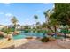 Gorgeous pool with rock features and lush landscaping provides privacy and relaxation at 3441 S Camellia Pl, Chandler, AZ 85248