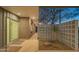 Modern entryway featuring a stylish front door, brick facade, and a decorative breeze block wall at 3531 E Onyx Ave, Phoenix, AZ 85028