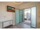 Bright foyer with a modern glass door and stylish decor at 3531 E Onyx Ave, Phoenix, AZ 85028