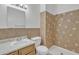 Bathroom with decorative tile accents, shower and standard vanity at 3646 N 69Th Ave # 38, Phoenix, AZ 85033