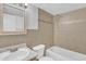 This bathroom features neutral tile, tub with shower, modern faucet and vanity sink at 3646 N 69Th Ave # 38, Phoenix, AZ 85033