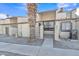 Townhome exterior with palm tree and white gravel landscaping at 3646 N 69Th Ave # 38, Phoenix, AZ 85033