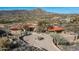 Sprawling desert home featuring a circular driveway, tile roof and mountain views at 40947 N 107Th Pl, Scottsdale, AZ 85262