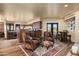 Open-concept living area adjacent to the kitchen with comfortable seating and decor at 40947 N 107Th Pl, Scottsdale, AZ 85262