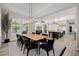 Open-concept dining area with a modern chandelier, connecting to the gourmet kitchen and living space at 4191 S Emerald Dr, Chandler, AZ 85249