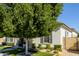 Charming home featuring mature landscaping, manicured lawn, and inviting curb appeal at 4191 S Emerald Dr, Chandler, AZ 85249