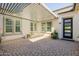 Stylish covered patio showcasing the stone pavers and outdoor living space at 4191 S Emerald Dr, Chandler, AZ 85249