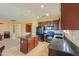 Spacious kitchen with stainless appliances and a kitchen island at 42297 W Lunar St, Maricopa, AZ 85138