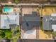 Drone shot of the property's roof and grounds, highlighting the pool and proximity to surrounding homes at 443 W Mulberry Dr, Phoenix, AZ 85013