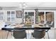 Stylish dining area with a contemporary table setting, connecting to the outdoor patio through sliding glass doors at 443 W Mulberry Dr, Phoenix, AZ 85013