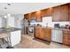 This kitchen features stainless appliances, granite countertops, and ample cabinet space at 443 W Mulberry Dr, Phoenix, AZ 85013