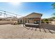 Enjoy this backyard featuring gravel, patio furniture, a pergola and string lights perfect for outdoor entertaining at 4602 E Firestone Dr, Chandler, AZ 85249