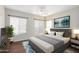 Serene bedroom with neutral tones, natural light, and stylish decor for a relaxing retreat at 4602 E Firestone Dr, Chandler, AZ 85249