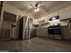 This bright kitchen features stainless steel appliances, white cabinets and gray counters at 46312 N 38Th Ave, New River, AZ 85087