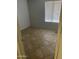 Cozy bedroom with tile flooring, and a window for natural light at 4927 W Golden Ln, Glendale, AZ 85302