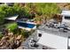Aerial view showcases pool, deck, and lush landscaping on a mountainside property at 4959 E Red Rock Dr, Phoenix, AZ 85018