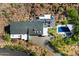 Aerial shot of the property with a pool, patio, and stunning desert landscaping at 4959 E Red Rock Dr, Phoenix, AZ 85018