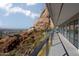 Balcony view showcases city skyline meeting a majestic desert mountain backdrop at 4959 E Red Rock Dr, Phoenix, AZ 85018