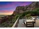 Outdoor deck with comfortable seating, providing stunning views of the surrounding mountains and city at 4959 E Red Rock Dr, Phoenix, AZ 85018