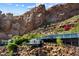 Modern home built into a mountainside with a tiered design and incredible mountain views at 4959 E Red Rock Dr, Phoenix, AZ 85018