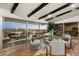 Living room with floor to ceiling windows, comfortable seating, and scenic outdoor views at 4959 E Red Rock Dr, Phoenix, AZ 85018