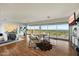 Bright main bedroom features hardwood floors, sitting area, and panoramic views at 4959 E Red Rock Dr, Phoenix, AZ 85018