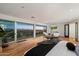 Luxurious main bedroom features hardwood floors, sitting area, and city views at 4959 E Red Rock Dr, Phoenix, AZ 85018