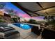 Beautiful backyard pool and lounge area with sunset views at 4959 E Red Rock Dr, Phoenix, AZ 85018
