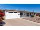 Lovely single-story home with a garage, well-kept landscaping, and inviting curb appeal at 5526 E Cicero St, Mesa, AZ 85205