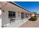 Inviting front porch with seating, decor, and a welcoming entryway at 5526 E Cicero St, Mesa, AZ 85205