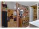 Unique bathroom featuring decorative cabinet and mirrors, enhancing the style and ambiance of the space at 5848 W Gelding Dr, Glendale, AZ 85306