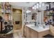 Bright bathroom with a walk-in shower, stylish vanity, and plenty of natural light at 5848 W Gelding Dr, Glendale, AZ 85306