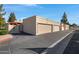 Exterior view of garages showing unit number on exterior with reserved parking at 5848 W Gelding Dr, Glendale, AZ 85306