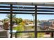 Beautiful city and treetop views from a large picture window with horizontal blinds at 7167 E Rancho Vista Dr # 4006, Scottsdale, AZ 85251