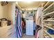 Bright walk-in closet with built in shelving, drawers and ample storage for clothes, handbags, and shoes at 7167 E Rancho Vista Dr # 4006, Scottsdale, AZ 85251