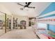 ' bedroom with bunk beds, a ceiling fan, and built-in shelving at 7520 S Jentilly Ln, Tempe, AZ 85283