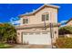 Beautiful two-story home featuring a two-car garage, landscaped yard, and a basketball hoop at 7520 S Jentilly Ln, Tempe, AZ 85283