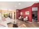 Open-concept living room with tile flooring, ample natural light, and contemporary furnishings at 7520 S Jentilly Ln, Tempe, AZ 85283