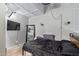 Bedroom featuring modern minimalist decor, a ceiling fan and natural light at 8055 E Thomas Rd # E106, Scottsdale, AZ 85251