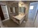 Bathroom featuring a dual sink vanity, ample counter space, and a functional layout at 8124 N 45Th Ave, Glendale, AZ 85302