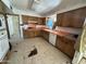 Kitchen featuring wooden cabinets and essential appliances, providing functionality and practicality at 8124 N 45Th Ave, Glendale, AZ 85302