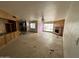 Open living room area featuring a fireplace, a built-in unit, and seamless access to the kitchen at 8124 N 45Th Ave, Glendale, AZ 85302