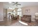 Bright living room with skylight, adjacent to a modern kitchen at 8444 W Rockwood Dr, Peoria, AZ 85382