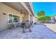 Covered patio area with comfortable seating and tiled flooring at 8444 W Rockwood Dr, Peoria, AZ 85382