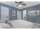 Bedroom with ensuite bath and a ceiling fan at 8556 E Pecos Ln, Scottsdale, AZ 85250