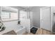 A bright bathroom features a soaking tub and a glass-enclosed shower for relaxing at 868 W Desert Glen Dr, San Tan Valley, AZ 85143