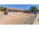 Exterior view of a cozy home with a covered parking and low maintenance front yard at 8816 W Catalina Dr, Phoenix, AZ 85037