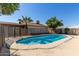 A sparkling swimming pool and landscaped backyard enhance this beautiful property at 8816 W Catalina Dr, Phoenix, AZ 85037