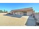 Backyard of the house with a covered patio and a gravel area at 934 E Carlise Rd, Phoenix, AZ 85086