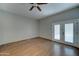 Bedroom with wood floors and French doors leading to the outside at 934 E Carlise Rd, Phoenix, AZ 85086